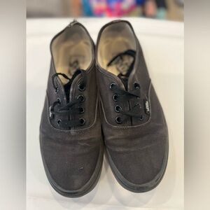 Well loved solid black vans